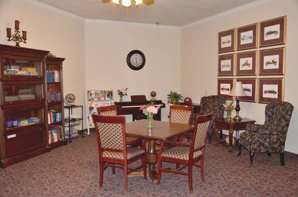Interior view of a cozy common area with seating