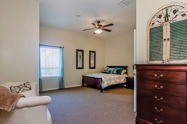 Cozy interior of a resident room with furniture
