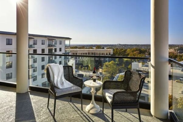 Outdoor seating area with a view overlooking the facility