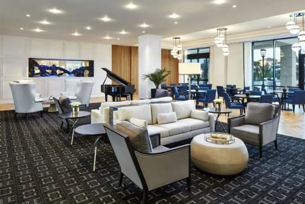 Interior view of a stylish common area with seating