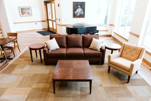 Cozy common area with seating and natural light