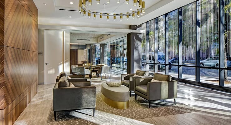 Modern lobby with seating and large windows