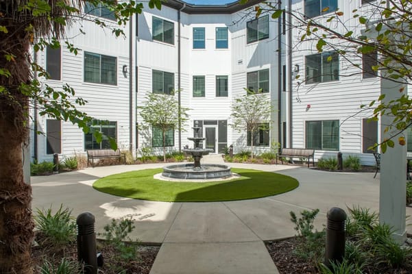 Serene courtyard with fountain and seating