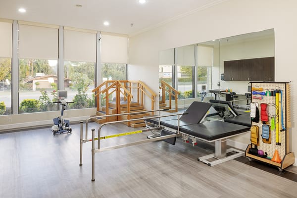 Rehabilitation area with exercise equipment and therapy tools