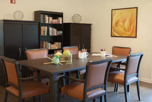 Interior common area with a table and chairs