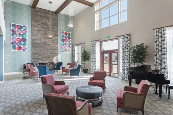 Bright common area with modern seating and decor