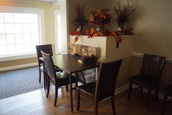 Cozy common area with fall decorations and seating