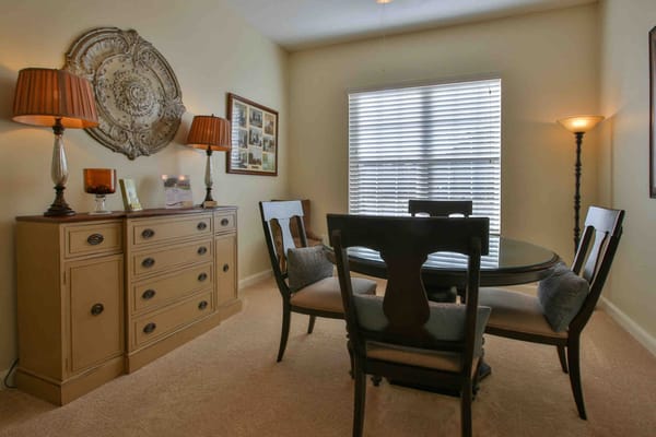 Cozy dining area with a round table and chairs