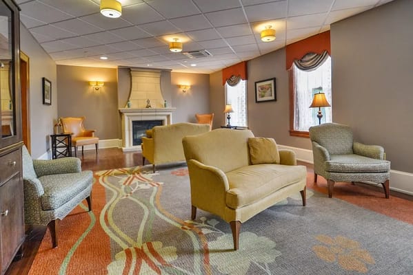 Bright common area with comfortable seating and decor