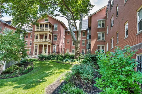 Exterior view of the facility's garden and building