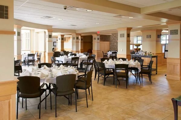 Interior dining area with tables set for a meal