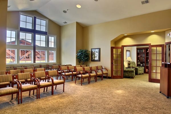 Interior view of a spacious common area with seating