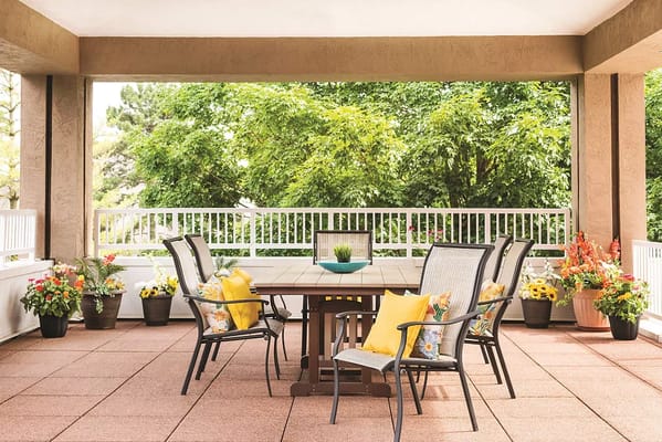 Outdoor patio with seating and flower pots