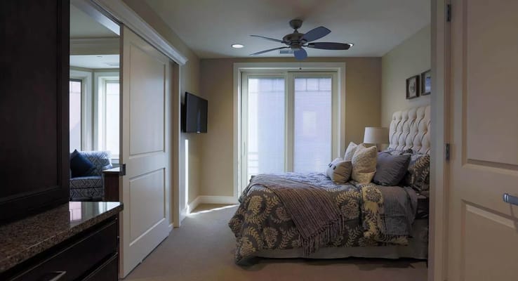 Cozy bedroom interior with bed and window light