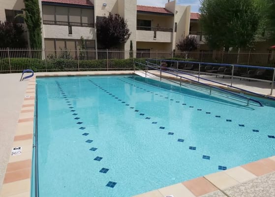 A sunny outdoor pool area at the facility
