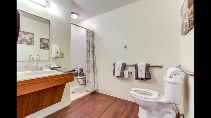 Clean and modern bathroom with shower and sink