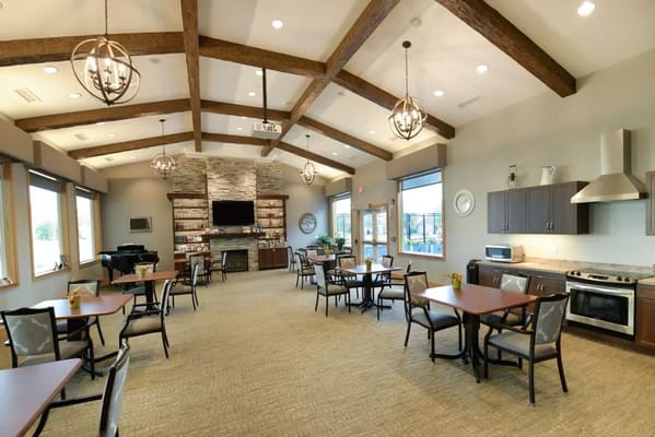 Bright dining area with tables and chairs