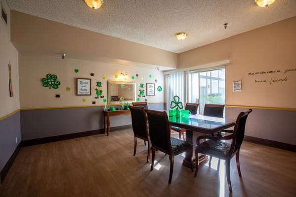 Bright common area with festive decorations and seating