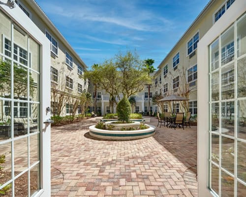 View of the courtyard with seating and a fountain