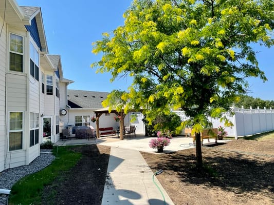 Outdoor view of Wildwood Grove with landscaping