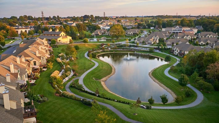 Aerial view of a serene community with water features
