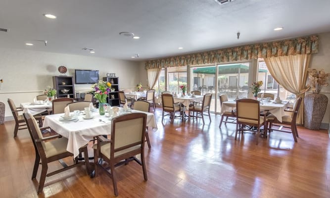 Dining area with tables set for a meal