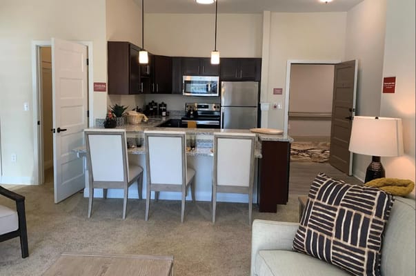 Modern kitchen and living area at Windsor Pointe of Jacksonville