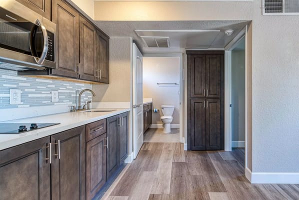 Interior view of a kitchen and bathroom area