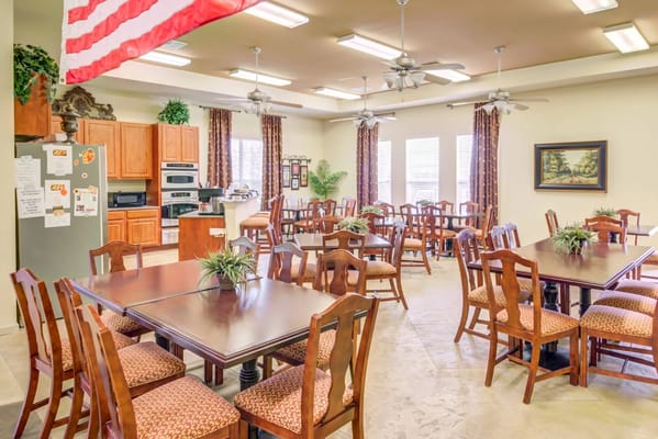 Bright dining room with wooden tables and chairs