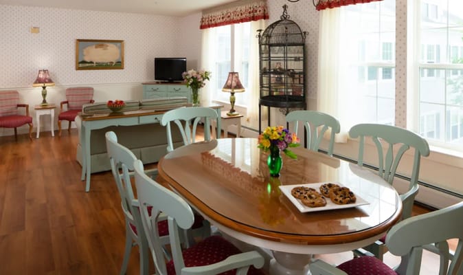 Dining area with table and food snacks