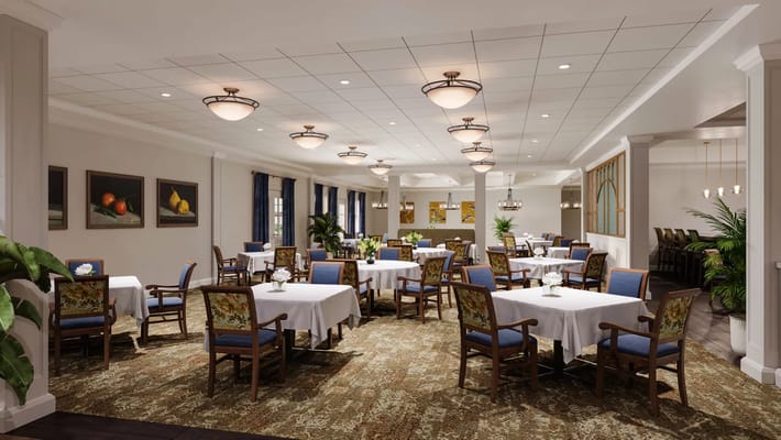 Well-furnished dining room with tables and chairs