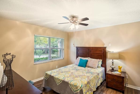 Cozy resident room with a bed and window light