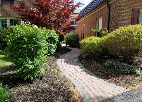 Pathway through landscaped gardens at the facility