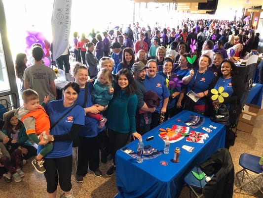 Group of staff and participants at a community event
