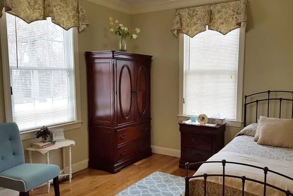 Cozy resident room with natural light and decor