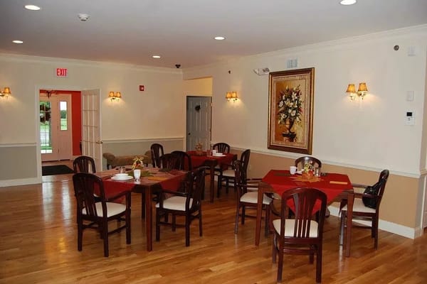Dining area with tables set for a meal