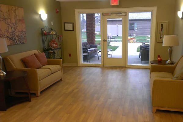 Interior common area with seating and outdoor view