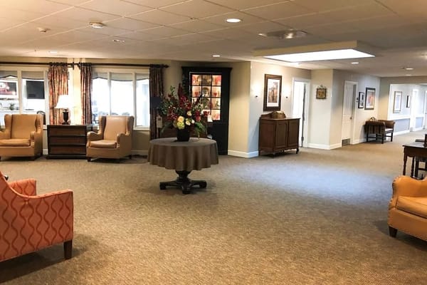 Bright common area with seating and decor