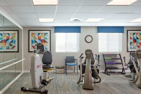 Interior view of a gym area with exercise equipment