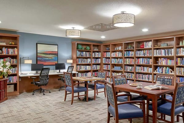 Cozy interior of a library with bookshelves and seating