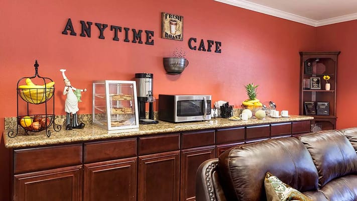 Interior view of a cafe area with seating and snacks