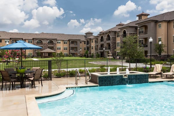 View of the outdoor pool and buildings at the facility