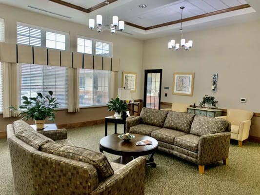 Inviting common area with comfortable seating and plants