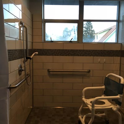 Accessible shower space with safety features