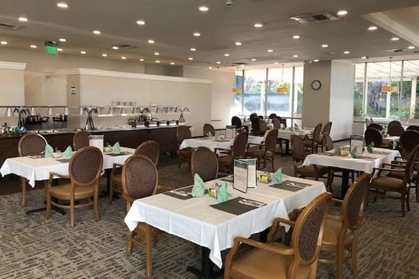 Bright dining room set for a meal service