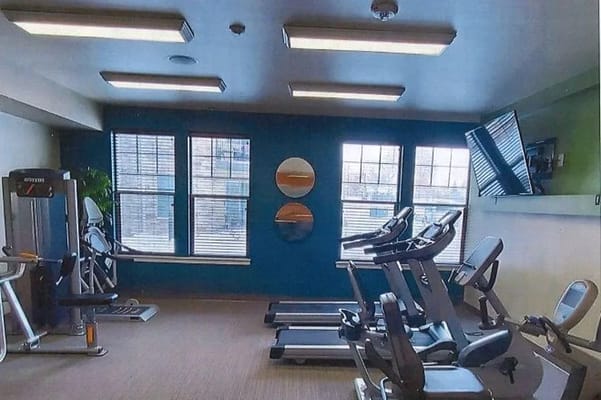 Interior view of a fitness area with equipment