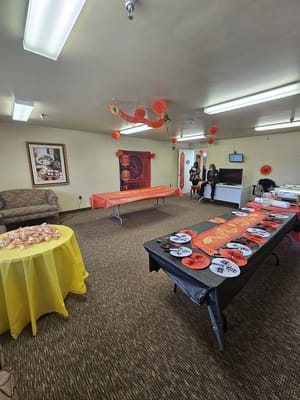 Residents celebrating a festive event in a common area