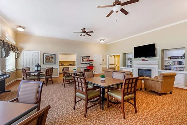 Bright common area with tables and seating