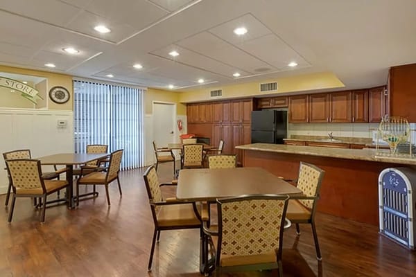Bright dining area with tables and chairs