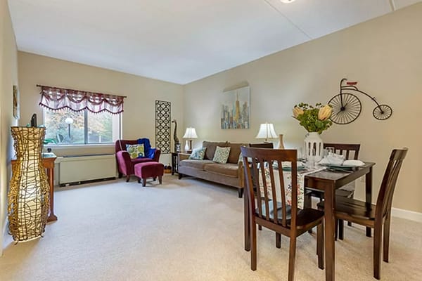 Cozy resident living space with seating and dining area
